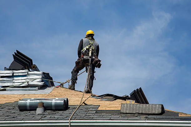 Professional Gutter Installation technician working in Russellville, AL